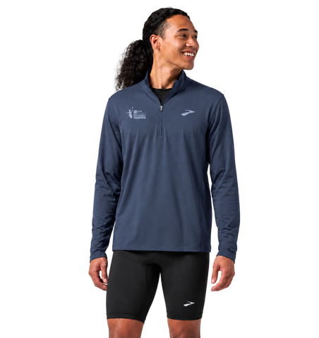 Front view of model wearing the CNO IMM Men's Brooks Dash 1/2 Zip in Blue Slate