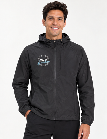 Front model view of the black men's CNO IMM 26.2 finisher jacket with a cream and light-blue emblem on the wearer's right chest.